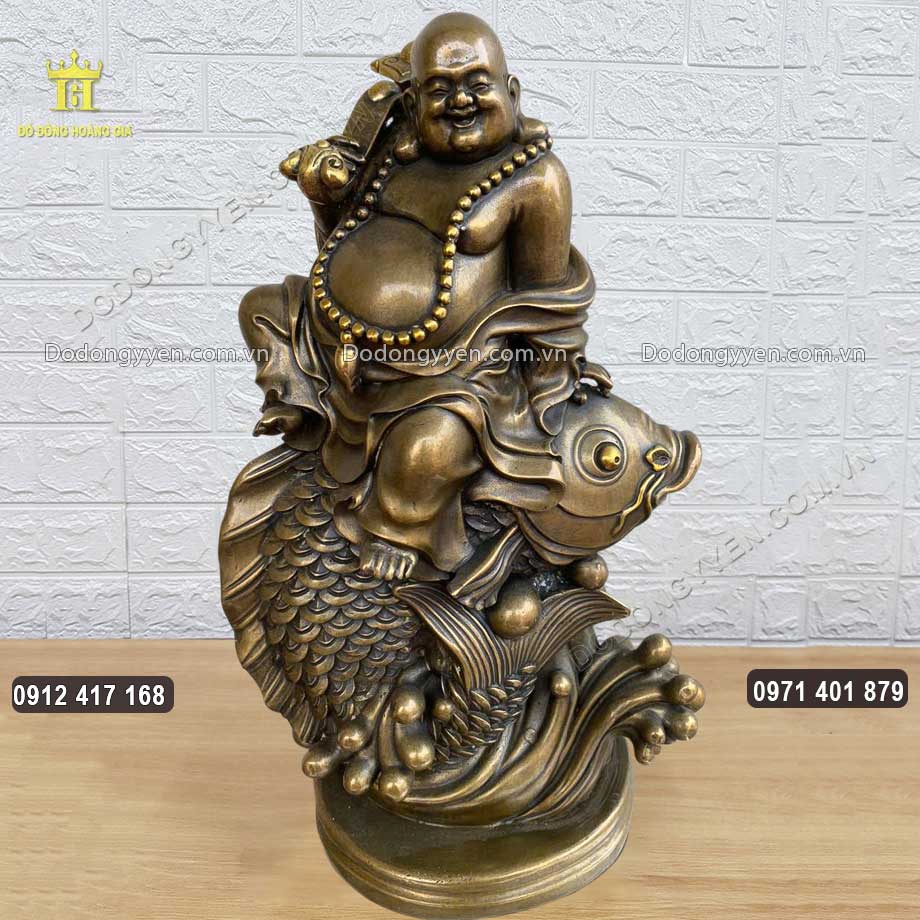 Tượng Phật Di Lặc Cưỡi Cá Chép Bằng Đồng Vàng Hun Giả Cổ Tượng Phật Di Lặc Cưỡi Cá Chép Bằng Đồng Vàng Hun Giả Cổ